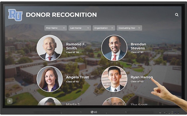 Interactive donor recognition touchscreen kiosk display showing donor names, photos, and giving levels.